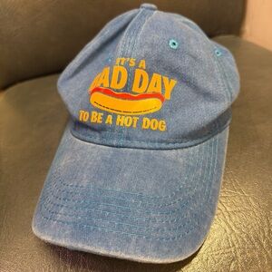 Blue Baseball Cap with 'It's a Bad Day to Be a Hot Dog' Graphic